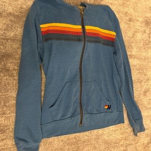 Worn, no flaws, pretty blue, comfortable